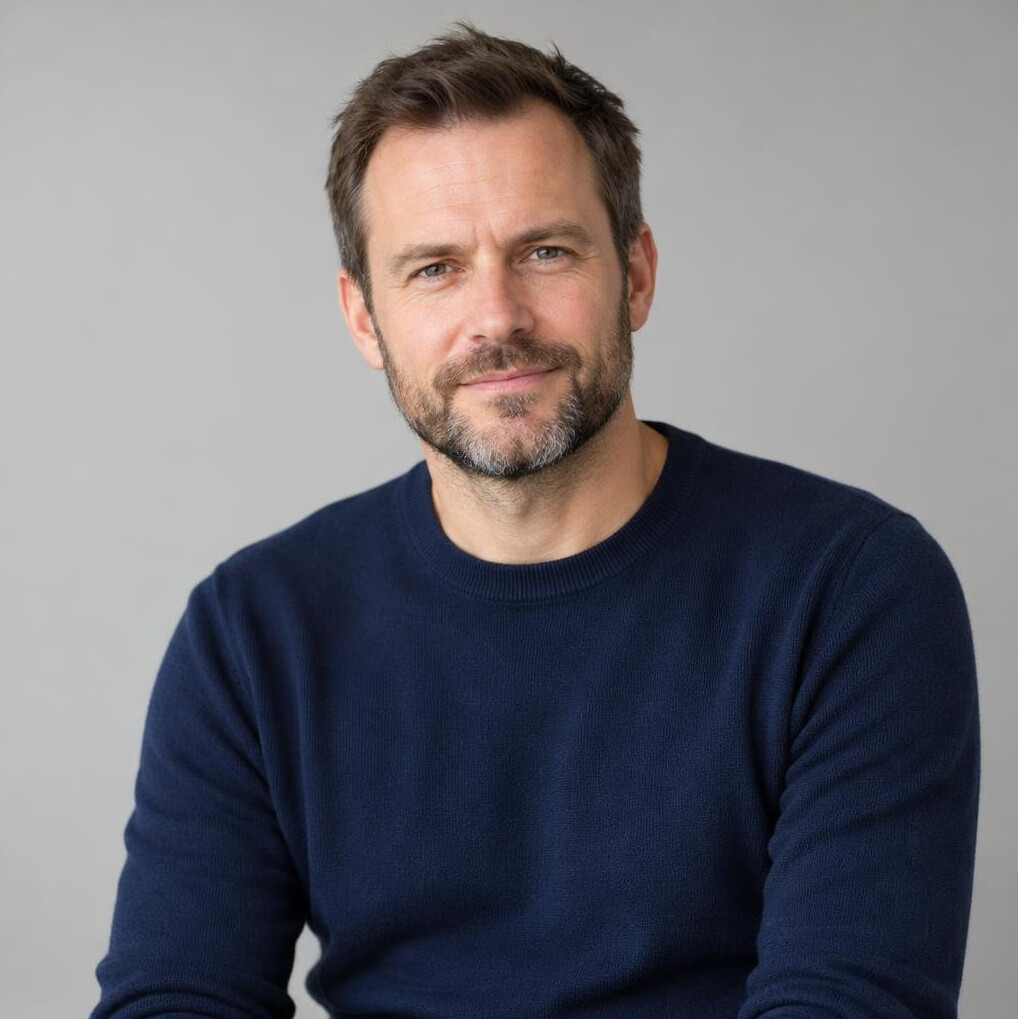 Portrait of a bearded man looking at the camera